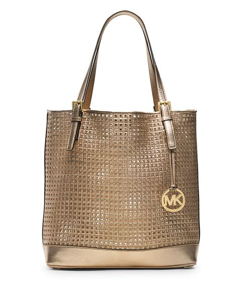 michael kors gold metallic handbag|Michael Kors large gold tote.